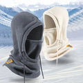 Halefield windproof fleece hood in gray and cream, mask up, on snow